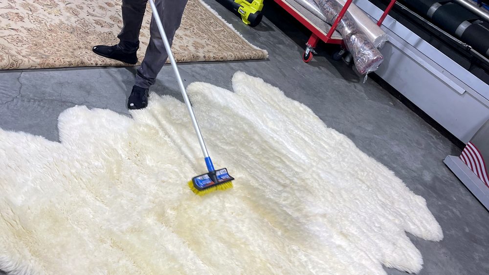 Dr. Carpet18 rug cleaning facility with rugs collected from homes and prepared for cleaning