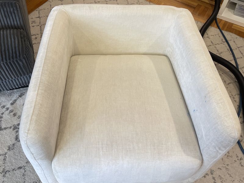 The same cream armchair after upholstery cleaning by Dr. Carpet18